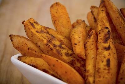 Patates douces frites aromatisés au cumin sont souvent trouvés dans les grands repas communautaires zoulous